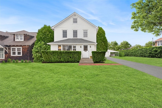 view of front of home with a front yard