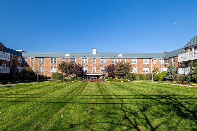 surrounding community featuring a lawn