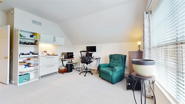 office with vaulted ceiling, carpet, and visible vents