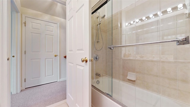 full bath with shower / bath combination with glass door