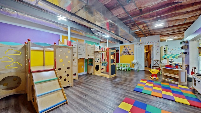 recreation room featuring wood finished floors