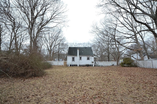 exterior space featuring a fenced backyard