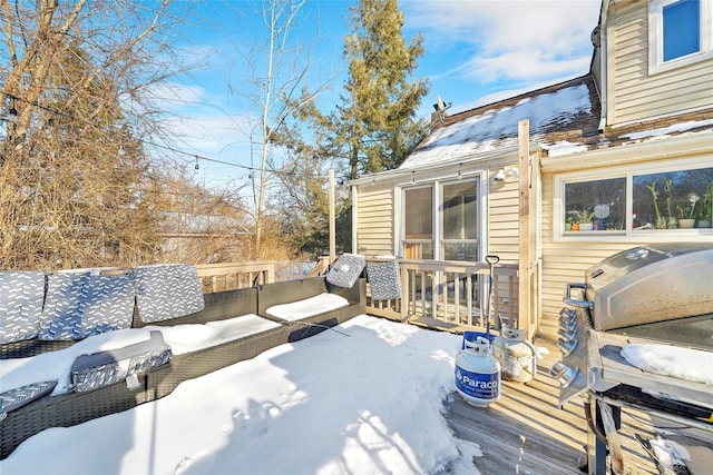 view of snow covered deck