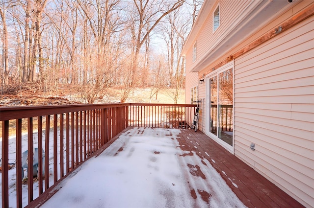 view of snow covered deck