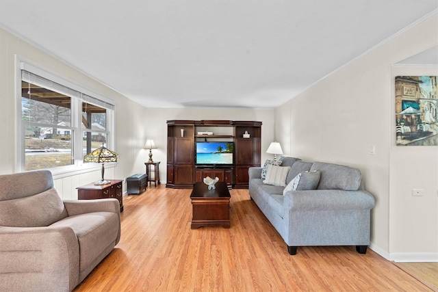 living room with light wood-style floors and baseboards