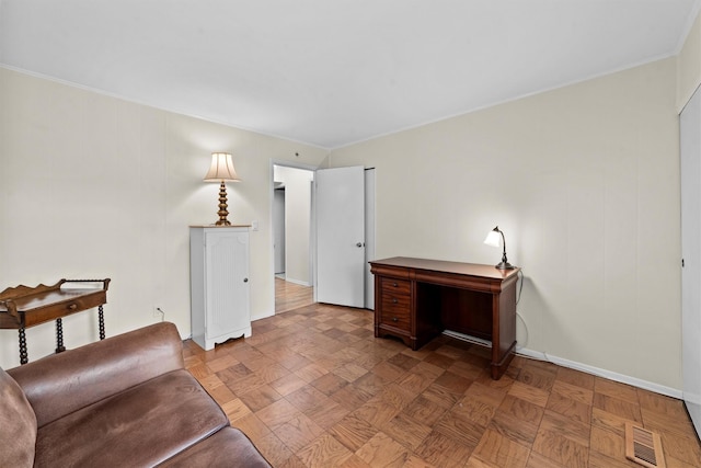 office space featuring visible vents and baseboards