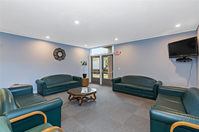 living area featuring french doors and recessed lighting