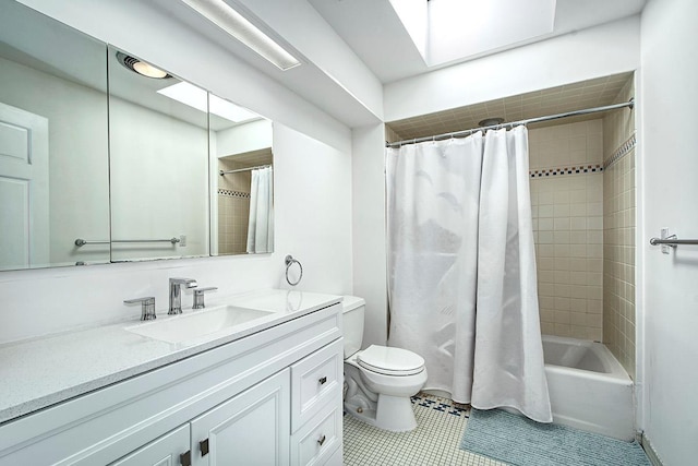 full bathroom featuring shower / tub combo, vanity, tile patterned flooring, and toilet