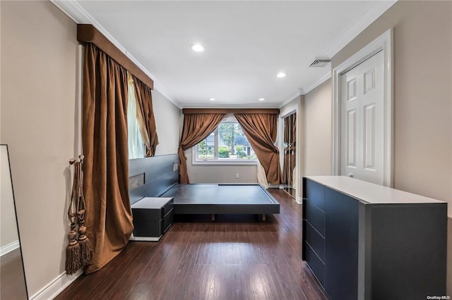 interior space with crown molding, baseboards, dark wood-type flooring, and recessed lighting