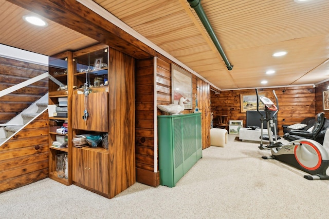 interior space featuring carpet floors, wood walls, wooden ceiling, and recessed lighting