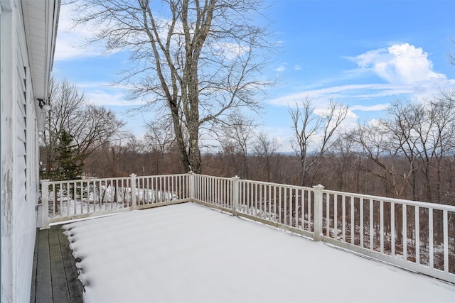 view of snow covered deck