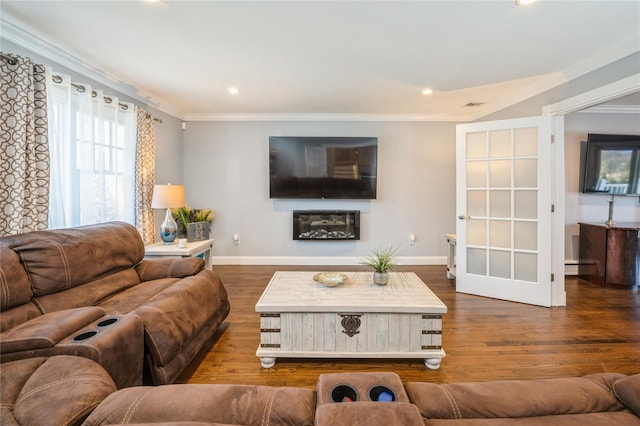 living area with ornamental molding, recessed lighting, baseboards, and wood finished floors