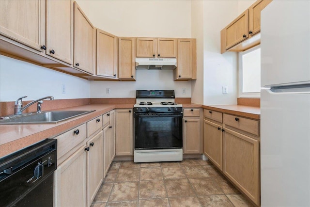 kitchen with sink, range with gas cooktop, light brown cabinets, white refrigerator, and black dishwasher