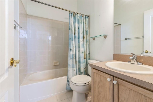 full bathroom featuring vanity, shower / bathtub combination with curtain, tile patterned floors, and toilet