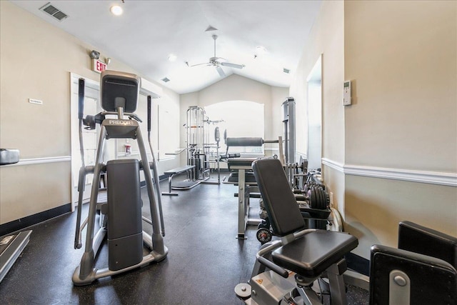 workout area with ceiling fan, vaulted ceiling, and a healthy amount of sunlight