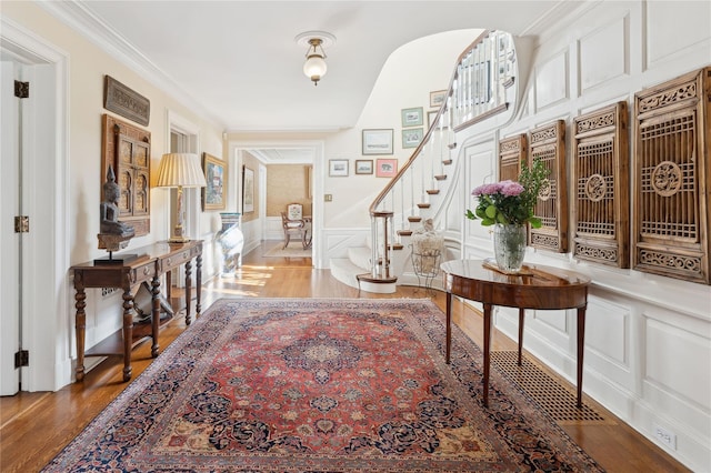 133AKA139 Hampshire Rd, Bronxville, NY 10708 - foyer with a decorative wall, wood finished floors, stairway, and a wainscoted wall