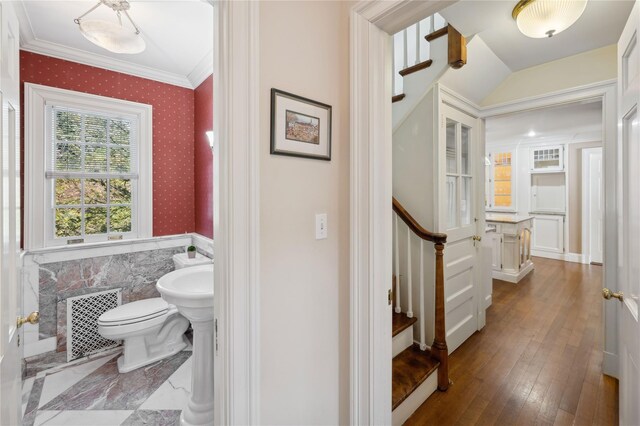 133AKA139 Hampshire Rd, Bronxville, NY 10708 - half bathroom with crown molding, a wainscoted wall, wallpapered walls, toilet, and hardwood / wood-style floors