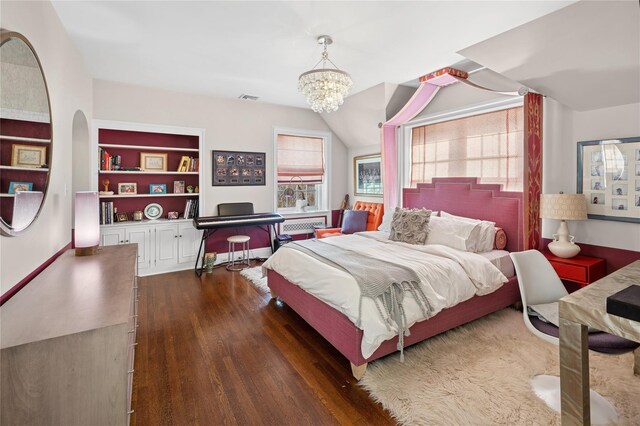 133AKA139 Hampshire Rd, Bronxville, NY 10708 - bedroom featuring multiple windows, wood finished floors, a chandelier, and arched walkways