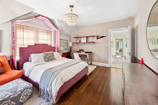 133AKA139 Hampshire Rd, Bronxville, NY 10708 - bedroom featuring dark wood finished floors, a chandelier, vaulted ceiling, and baseboards