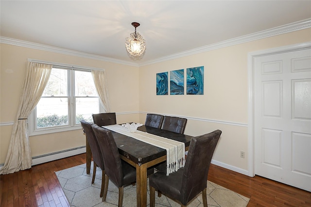 dining room with dark wood-type flooring, a baseboard radiator, a notable chandelier, and ornamental molding