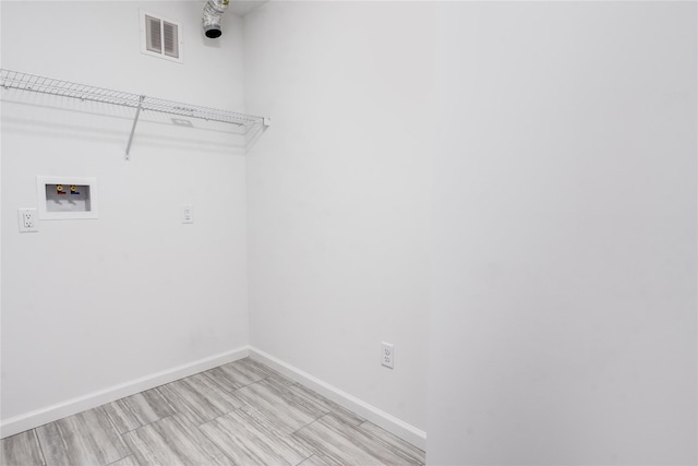 laundry room featuring hookup for a washing machine