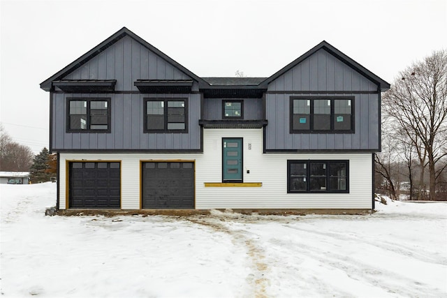 modern inspired farmhouse featuring a garage