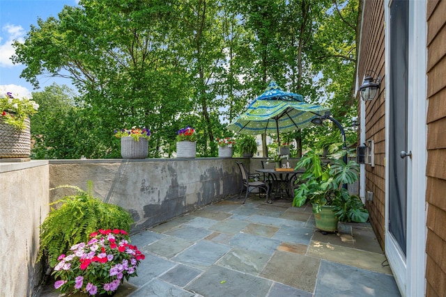 view of patio featuring outdoor dining area