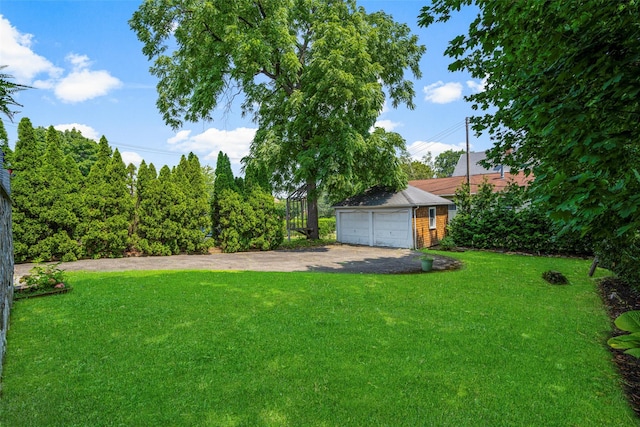 view of yard featuring a garage