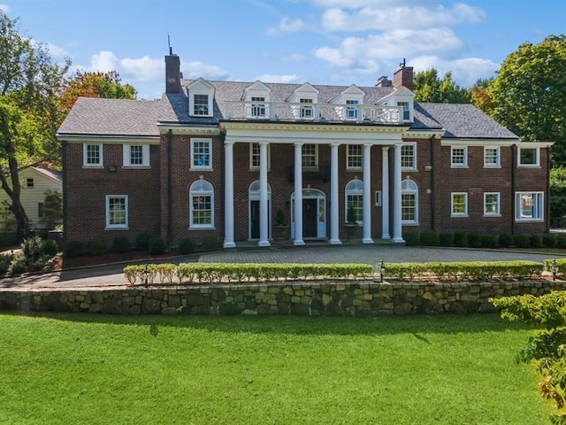 view of front of house with a front yard