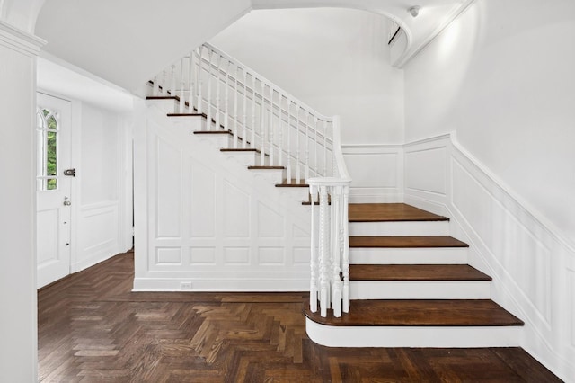 stairway with parquet floors