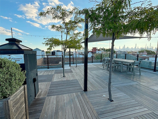 wooden terrace with a gazebo