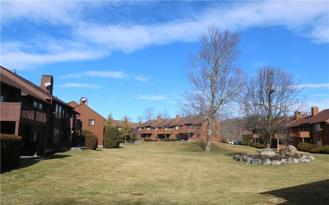 view of yard featuring a residential view