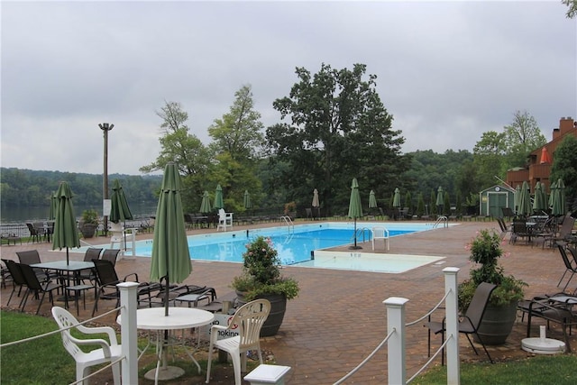 pool featuring a patio area