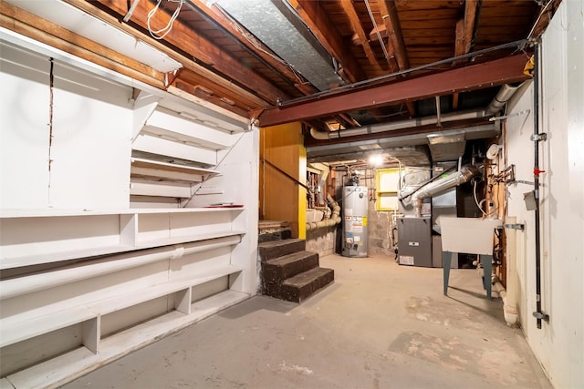 unfinished basement with water heater and stairs