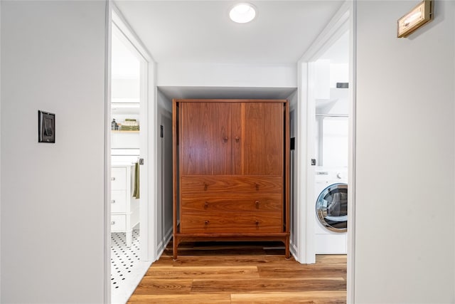 interior space featuring light hardwood / wood-style flooring and washer / clothes dryer