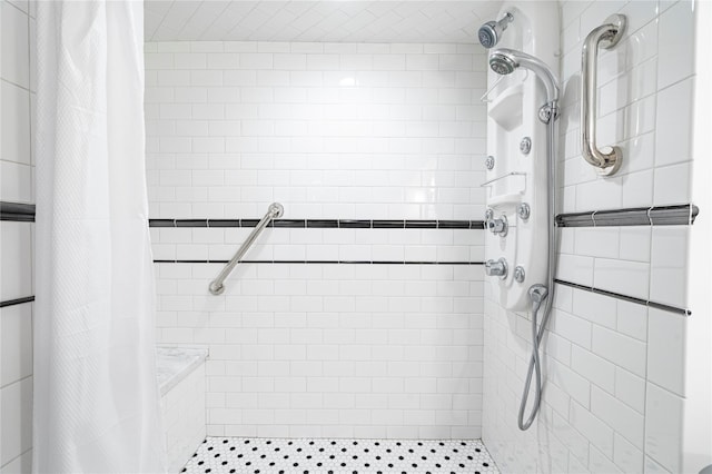 bathroom with a shower with curtain