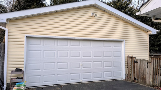 detached garage with fence