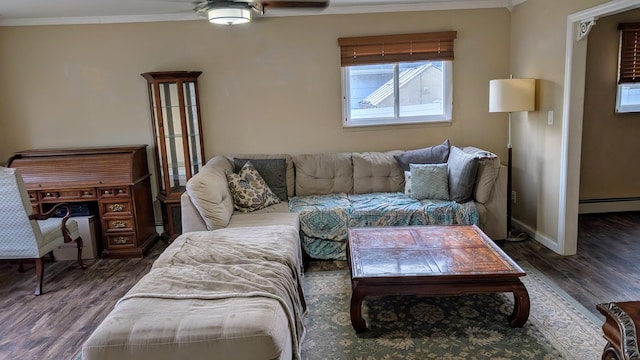 living room featuring wood finished floors, baseboards, a baseboard radiator, ceiling fan, and crown molding