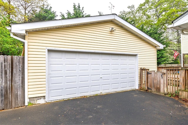 detached garage with fence