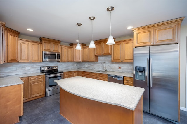 kitchen featuring stainless steel appliances, a sink, a center island, tasteful backsplash, and hanging light fixtures