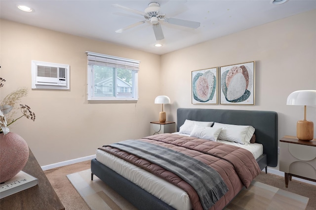 carpeted bedroom with baseboards, recessed lighting, ceiling fan, and a wall mounted air conditioner