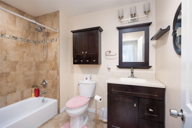 full bathroom with toilet, shower / tub combination, vanity, tile patterned flooring, and baseboards