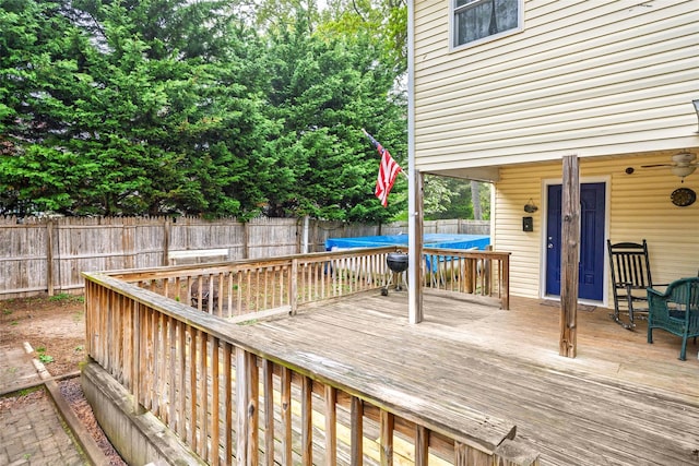 deck featuring a fenced backyard