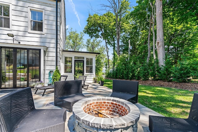 view of patio featuring an outdoor fire pit