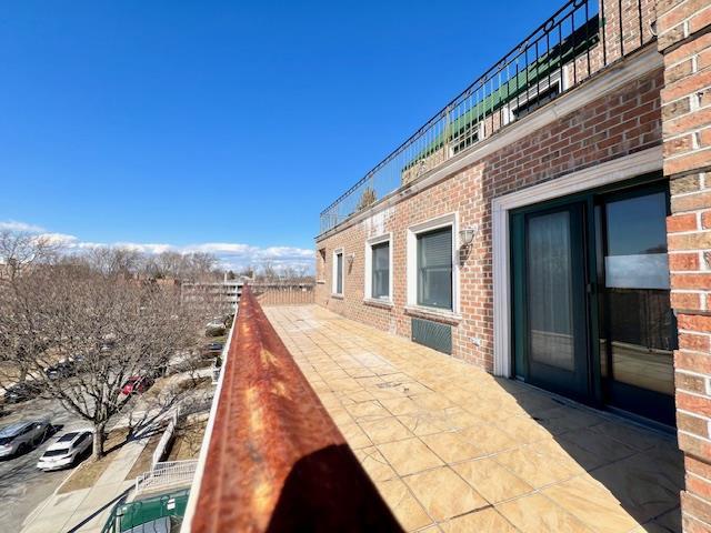 view of patio featuring fence