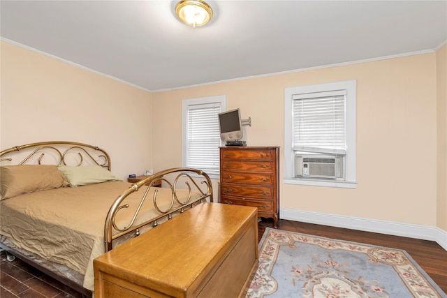 bedroom with ornamental molding, cooling unit, dark wood finished floors, and baseboards