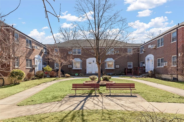 surrounding community featuring a residential view and a lawn