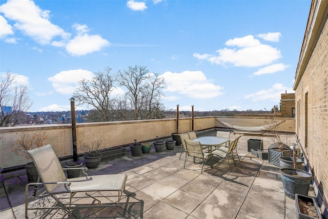 view of patio / terrace featuring central air condition unit and outdoor dining area