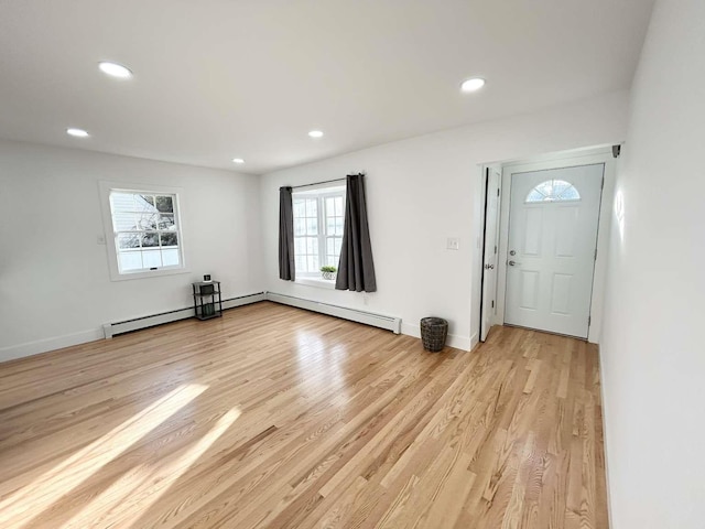 foyer entrance with light wood-type flooring