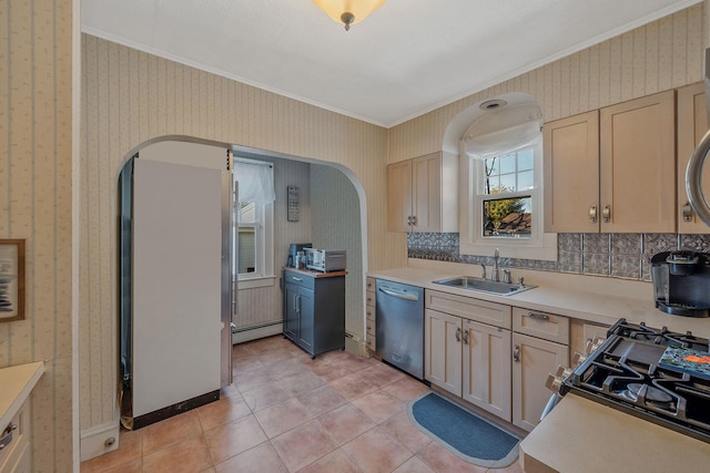 kitchen featuring a baseboard heating unit, a sink, light countertops, dishwasher, and wallpapered walls